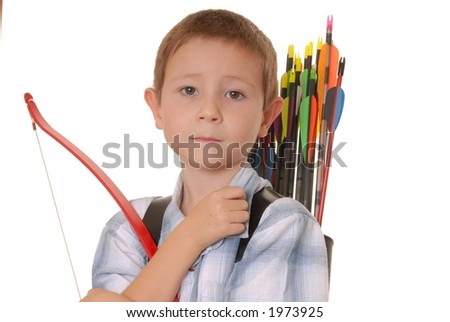Young boy with bow and arrow practicing archery Royalty-Free Stock Photo #1973925