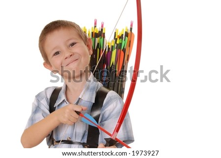 Young boy with bow and arrow practicing archery Royalty-Free Stock Photo #1973927