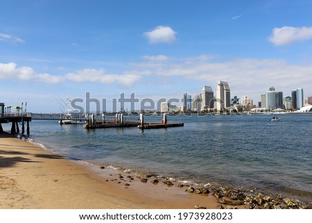 View of the Coronado ferry landing ramp  and Downtown San Diego Building across the bay in California. USA