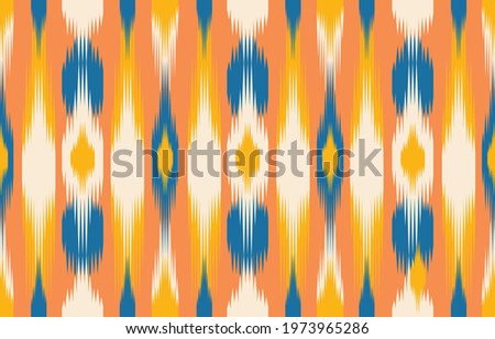Beautiful ethnic abstract ikat art. Seamless pattern in tribal, folk embroidery, Cute Mexican style. Aztec geometric art ornament print. Design for carpet, wallpaper, clothing, wrapping, fabric,cover.