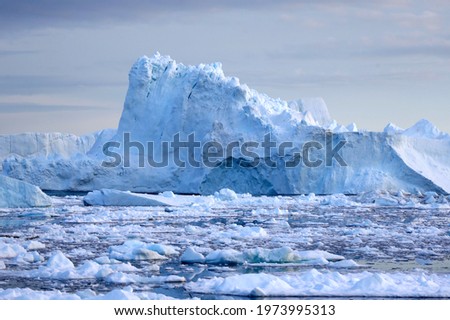 Greenlandic icebergs from the Ice Fjord in the Disko Bay near Ilulissat in Northern Greenland.