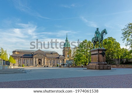 Panoramic view over Friedensplatz square to Hessian State Museum in German university city Darmstadt during daytime Royalty-Free Stock Photo #1974061538