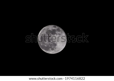 Picture of Full Moon glowing in midnight.