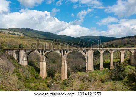 Ancient railway track bridge landscape. Horizontal aerial photography with drone. Concept of life, destiny or direction to follow, thought, reflection, meditation. Selective focus