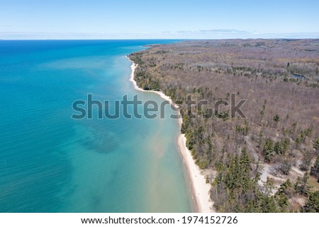Aerial photos from Eastport MI. Lake Michigan in the springtime during the afternoon.