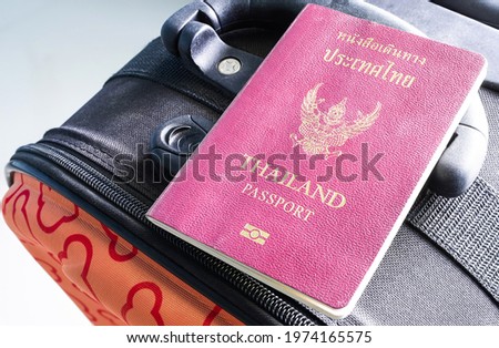 Thailand passport on Suitcase or luggage close up. Identity document in the journey international travel. transportation concept.