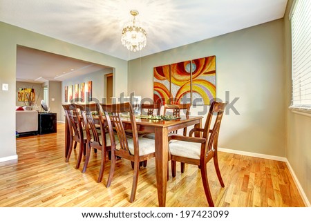 Open floor plan. View of dining area with table set and living room