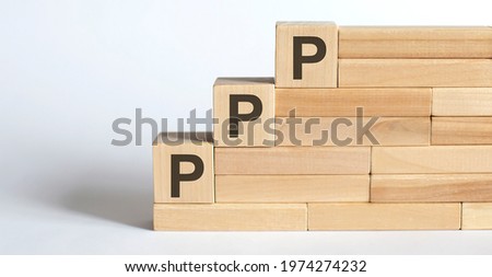 Work strategy on wood blocks PPP on the white background