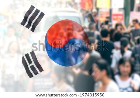 South Korea national flag as background and crowd of people, concept picture Royalty-Free Stock Photo #1974315950