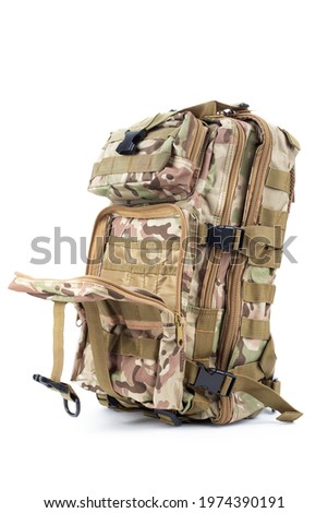 Open military backpack of khaki color on a white background. It can be used for hunting and tourism. Royalty-Free Stock Photo #1974390191