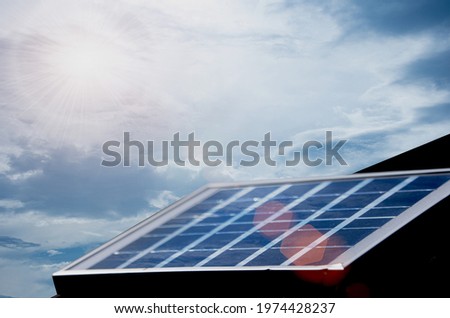 power solar panel on blue sky background.
alternative clean green energy concept.