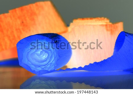 Colorful abstract composition with crepe, lights and shadows (inverted colors)