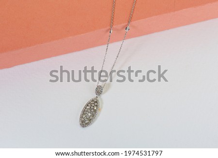 Design necklace on a abstract background
