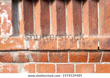 Abstract texture on red brickwall backdrop. Natural old city background.