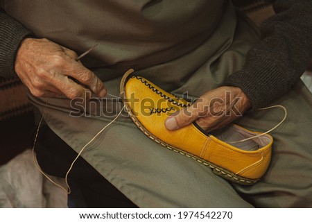 Footwear manufacturing by hand workmanship, leather shoes manual labor, gaziantep turkey Royalty-Free Stock Photo #1974542270