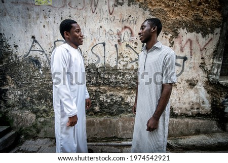 Two young black students standing out, high picture