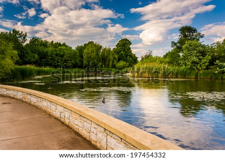 Walkway along a pond at Patterson Park, Baltimore, Maryland.