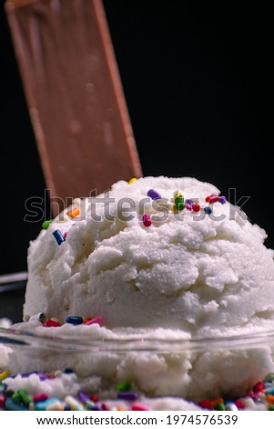 cream ice cream with colored sprinkles