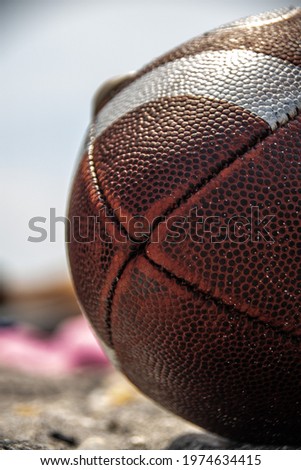 Macro shot of a football on a warm sunny day