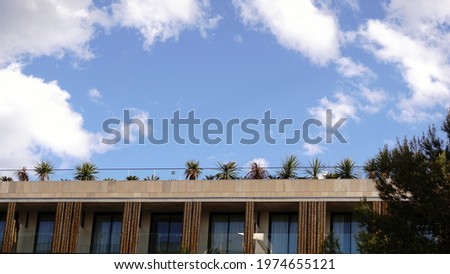 roof of apartment building against the sky