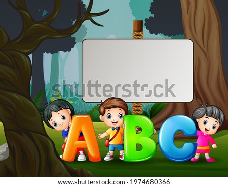 Cartoon happy children holding ABC letter in the park