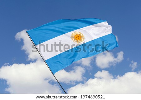 Argentina flag isolated on sky background with clipping path. close up waving flag of Argentina. flag symbols of Argentina.