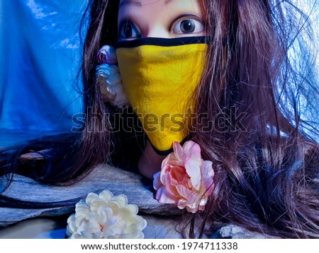 mannequin with beauty mask and flower for background