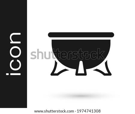 Black Halloween witch cauldron icon isolated on white background. Happy Halloween party.  Vector