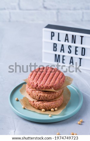 Burgers made from plant based meat, food reducing carbon footprint Royalty-Free Stock Photo #1974749723