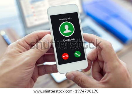 Incoming call with unknown number or caller ID on mobile phone Royalty-Free Stock Photo #1974798170