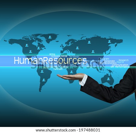  Executive Holding hand on "Human Resources" word cloud arrangement"