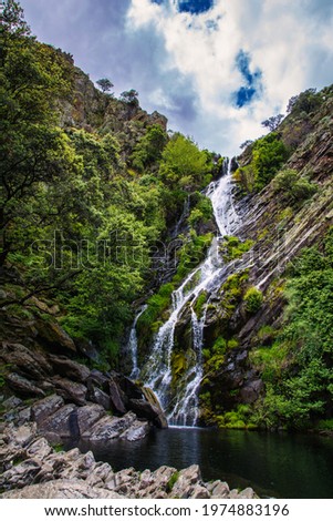 Landscape Of A Spectacular Waterfall  In The Middle Of Nature Called: El Chorrituelo De Ovejuela. Located In Las Hurdes, North Of Cáceres-Spain. Nature Royalty-Free Stock Photo #1974883196