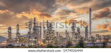 Oil and Gas Industrial zone,The equipment of oil refining,Close-up of industrial pipelines of an oil-refinery plant,Detail of oil pipeline with valves in large oil refinery. Royalty-Free Stock Photo #1974926444