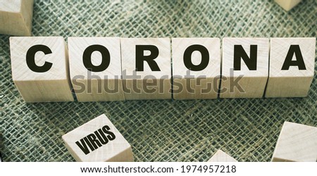what is coronavirus word written on wood block. what is coronavirus text on wooden table for your desing, coronavirus concept top view.