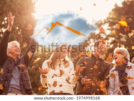 Composition of cloud with house icon over happy caucasian family in autumn park. home and family life concept digitally generated image.