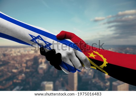 Shaking hands Israel and Angola