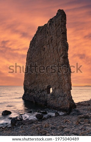 Parus Rock near the Black Sea, Russia at sunset Royalty-Free Stock Photo #1975040489