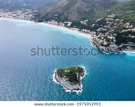 Aerial view of Bergeggi island, heart island from above, in Liguria, north Italy. Drone photography of the Ligurian coast, province of Savona with Spotorno and the island of Bergeggi, near Noli.