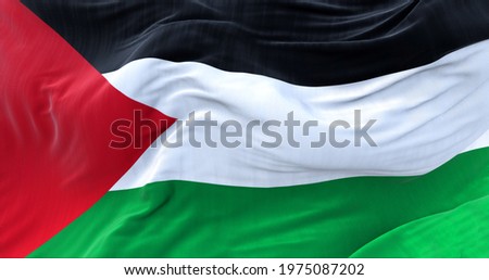 close up view of the flag of Palestine waving in the wind. Selective focus.