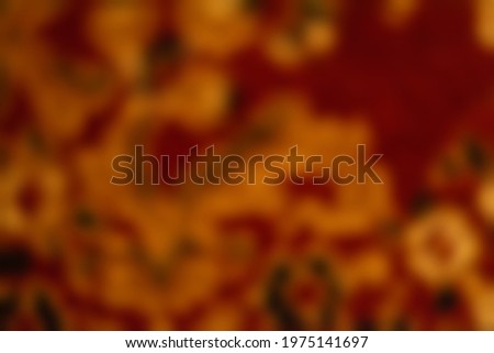 Decorative background, red-orange blurred surface with bokeh elements for decorative creative decoration. Stock Photo
