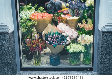Showcase with fresh flowers. Stylish background for social networks