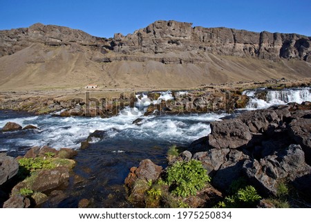 Mountainous landscape with river Fossalar near Kirkjubaejarklaustur, Southern Region, Iceland