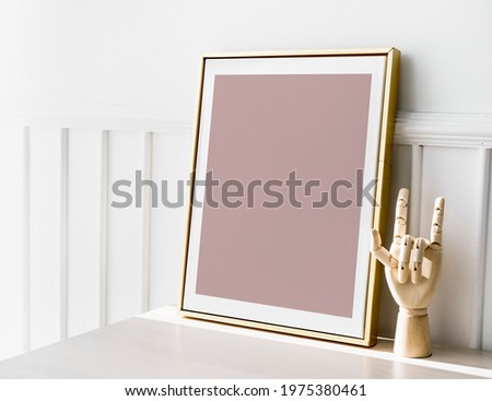 A golden picture frame mockup