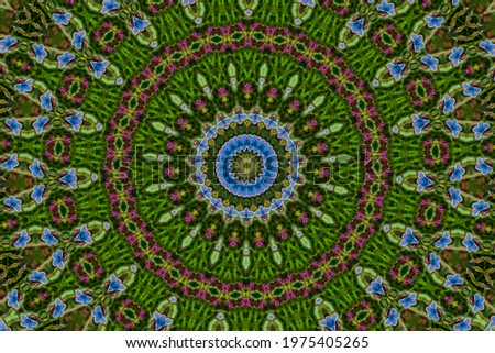 Kaleidoscope green abstract pattern background of blue butterflies, stock photo image