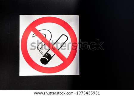 No smoking sign under the black background