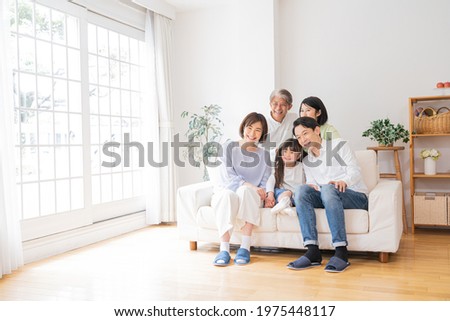Portrait of three generations of good friends  Royalty-Free Stock Photo #1975448117