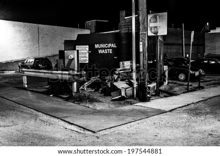 Dumpster in a parking lot at night in Hanover, Pennsylvania.