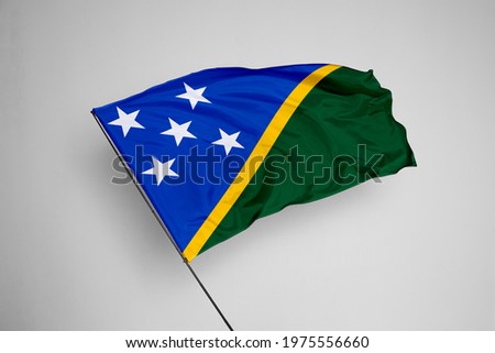 Solomon Islands flag isolated on white background with clipping path. close up waving flag of Solomon Islands. flag symbols of Solomon Islands.