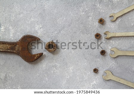 Wrench nuts and bolts on stone background. Father and Sons concept. Fathers Day concept. Flat lay.