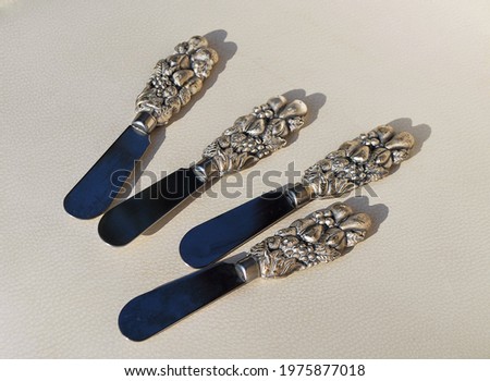 Set of cheese knives on the table